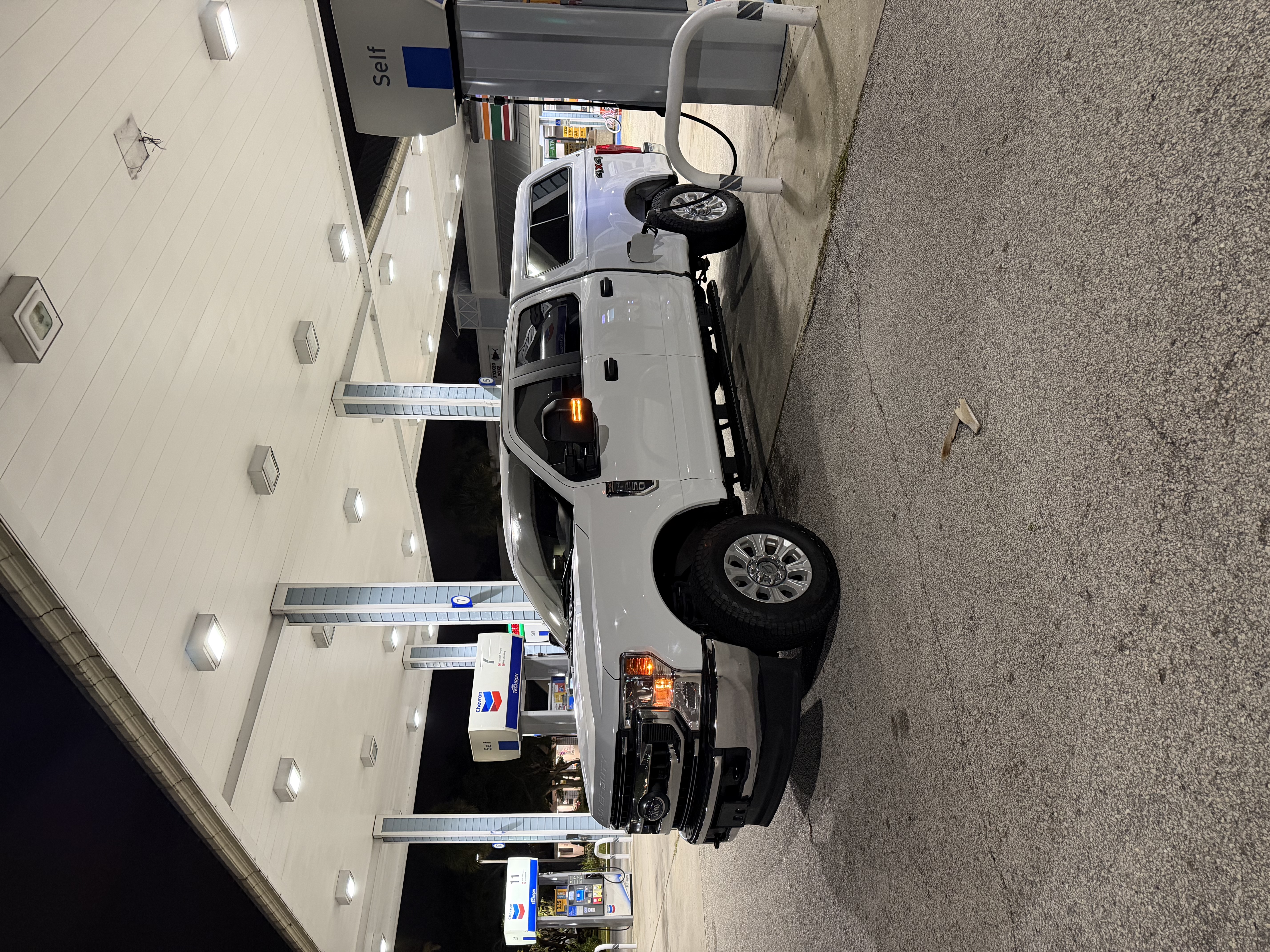 The HVAC Dude truck at a nighttime service stop